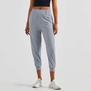 Lu Lu Lemon Align Jogger corto a vita alta con tasca Pantaloni da corsa leggeri e morbidi come il burro per allenamenti a basso impatto Leggings da yoga Capri sportivi