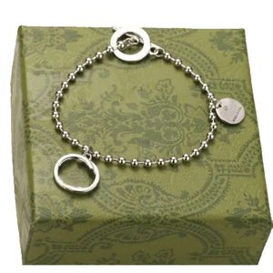 Högkvalitativ bokstav g smyckekedjor hängen freeshipping bijoux designer cci original förpackningslåsande kularmband är ett trendigt gåva