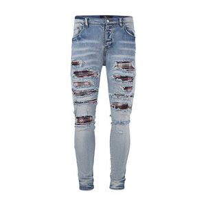 Designer Amirsshigh Street Autumn and Winter New Brodered Patchwork Hole Elastic Jeans för män och kvinnor