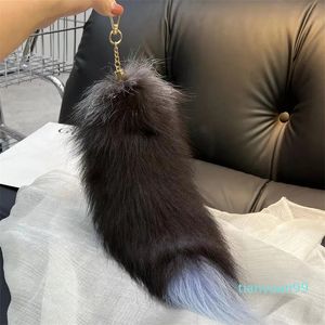 Mode räv svans päls nyckelchains unisex pompom pendelle bil nyckelhållare söta nyckelkedjor charm väska par gåvor