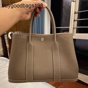 Designer Garden Party Bags Top Layer Cowhide Bag New Genuine Leather Womens Tote Portable Large Capacity Shopping Wedding Have Logo