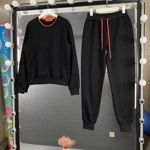 Designer de moda Sportswear Feminino de manga longa Loja de duas peças de calças e pulôver com design de impressão de cartas para roupas de rua