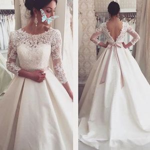 Lace Formal Bridal Gowns Boat Neck Long Sleeves Wedding Dresses backless Applique beading Sweep Train vestido de Ball Gown