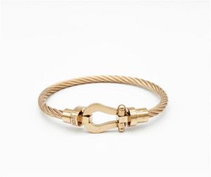 Bracciale da uomo da donna alla moda di marca Sier in oro giallo con cordino 2023 S con chiusura a ferro di cavallo6243618