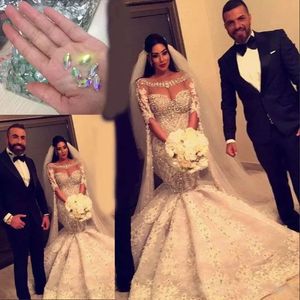 Dubai Arabo Perline di lusso Abiti da sposa a sirena di cristallo Mezze maniche lunghe Scollo rotondo Abiti da sposa country Vestido De Novia