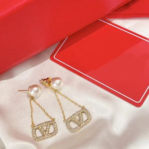 Luxur Designer Charm Earrings Women's Diamond 18K Gold Pendant Earrings Fashion Exquisite Simple SMEEXKE Högkvalitet med låda