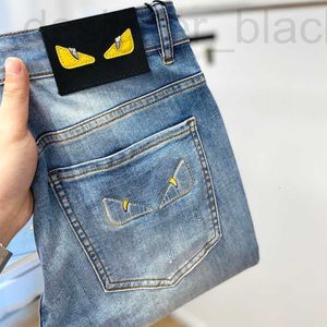 Kvinnors jeansdesigner Jeans 23 Vår/sommar New Men's Korean Edition Elastic Slim Fit Small Feet High Europe European Blue Monster Long Pants 53zu