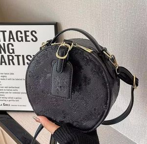 Lyx crossbody väska designer väska kvinna handväska axel väska riktig läder kamera väska rund väska fransad cross body classic modedesigner telefon väska