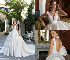 Eva Lendel Bohemian Wedding Dresses Deep V Neck Backless Sleeveless Sweep Train Country Bridal Dress Bow Simple Plus Size Wedding Gown