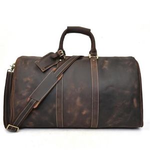 Designer- Nuova Fashion Men Women Borse da viaggio Bag borsetta 2019 Borse per bagagli Bag di grande capacità 58cm257x