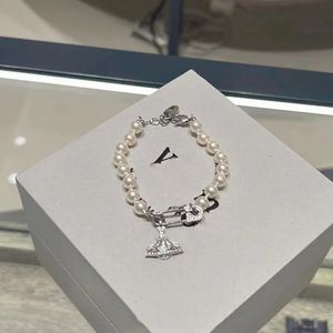 Vivi West Charm Bracelets Designer Saturn wydrążony w pełnej diamentowej bransoletce Pearl Pearl Bransoletka dla mężczyzn luksusowa biżuteria Orecchini bijoux cjeewelers-1