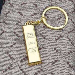 Porte-clés de styliste pour voiture, sac décoré avec des lingots d'or, cadeau conçu pour les hommes et les femmes de haute qualité
