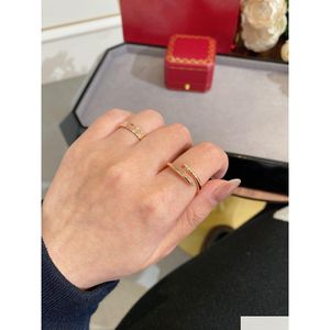 Bandringe Luxus-Designer-Ring dünner Nagel Top-Qualität Diamant für Frau Mann Galvanik 18 Karat klassisches Premium-Roségold mit Box Drop Dhebn