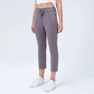 Calças de yoga roupas de ginástica mulheres leggings pele-amigável cordão estiramento fino ajuste correndo esporte treino moda casual capri collants 688ss 2023