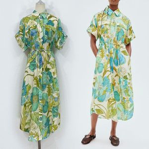 리넨 셔츠 치마 드레스 2024 새로운 기질 짧은 슬리브 캐주얼 한 느슨한 넥타이 넥타이 린넨 녹색 꽃 프린트 중간 길이 치마