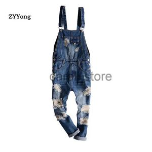 Pantaloni da uomo Tuta da buco blu Tuta da uomo in denim Jeans strappati strappati Bavaglino alla caviglia Hip Hop Tasca grande Pantaloni cargo coreani Pantaloni J231208