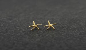 Orecchini a bottone con stelle marine alla moda Orecchini a bottone placcati in argento in lega di zinco Orecchini a bottone biologici marini per donna interi6981047