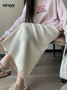 Spódnice Cirmyy Knitted Kobiety Kobiety Eleganckie solidne elastyczne pasty do marszczyków A Korean biuro Korean Office Lady Chic Midi spódnice 231211