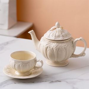 Mleczny wytłoczony ceramiczny garnek do kawy Puchar Kreatywna Europejska popołudniowa herbata Teapot Teakup Prosty biały porcela 308W