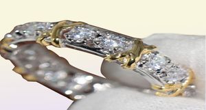 Whole Professional Eternity Diamonique CZ simulierter Diamant 10KT Weiß-Gelbgold gefüllter Ehering-Kreuzring, Größe 51126056951684046