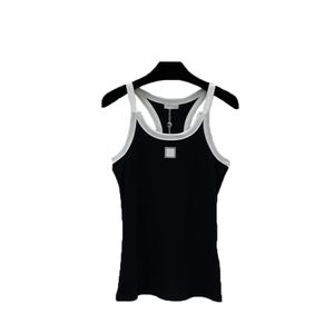 Gilet da donna estivo classico moda bianco e nero dal design di nicchia sottile e sottile in cotone, le piccole spalline del gilet si abbinano tutte all'interno