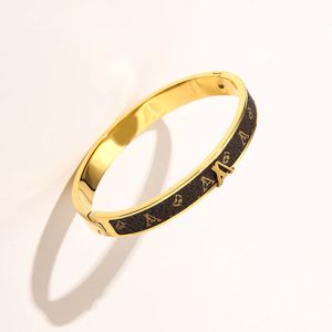 Luxury Fashion Designer Brand Herr- och kvinnors klassiska armband utsökta enkla smycken guld rostfritt stål lädermaterial armband trend smycken damer gåva