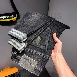 Herren-Jeans-Designer, schwarz, grau bedruckt, Jeans, männlich, koreanische Version der Gezeitenkarte, Fußhose, hohe elastische Hose, männlich, lose, wilde Trendhose CW5Q