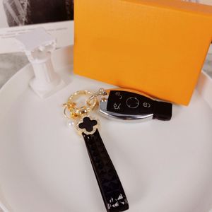 Ręcznie robione designerskie breloki wielokolorowe Key Key Women Mężczyznę skórzaną torbę portfel Smycz Smyczowe Złote Akcesoria