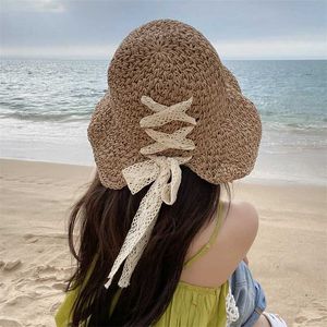 Breda randen hattar hink hattar kvinnor str att koreansk utgåva tidvattenmärke alla japanska sommaren tunna sol hatt spets båge ihålig hatt j240425