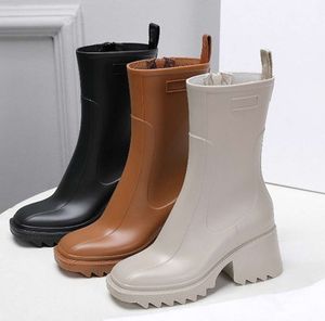 2024 Luxurys Designer Frauen Regenstiefel England Stil Wasserdichte Welly Gummi Wasser Regen Schuhe Ankle Boot Booties Plattform 231