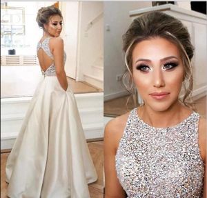 Jewel Top Beaded Prom Dresses with pocket backless Long Puffy Sequin Crystal Floor Length Prom Gowns Couture Keyhole Back Dresses Evening Wear Real Party