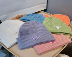 Women039s beanie stickad hatt med inverterade triangel bokstäver män039s caps gata vinter varm melon hud hattar godis färg 16 c8540522