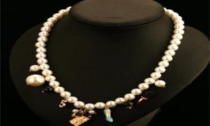 Брендовые роскошные ювелирные изделия, женское дизайнерское ожерелье с жемчугом и цветком, двойные цепочки для свитера, элегантные длинные серьги для девочек, подарок 2022 года, новинка R55490107