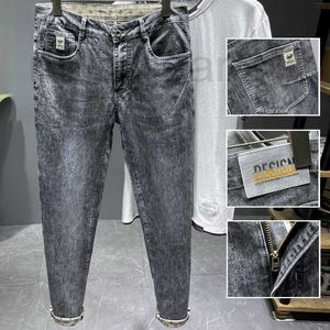 Calças de brim masculinas Designer de moda marca jeans homens soltos e versáteis pequenos tubos retos elásticos calças compridas primavera e outono homens novas calças de perna pequena ins S863