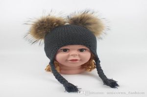 Knitted Hat Children Cute Winter Hats Two Faux Raccoon Fur Pompom Hat Boy Knitted Cap Warm Ears Earflap Thick Kids Beanies CNY9765613522