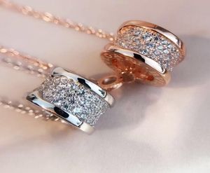 Populärt halsband lyxiga officiella reproduktioner diamanter hängen halsband toppkvalitet 18k guldpläterad kärleksserie avancerad AAAAA 1050159