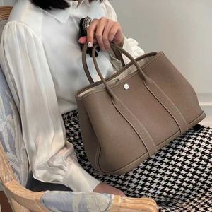 HREMMSS Party Garden Designer أكياس الكتف على الإنترنت متجر 2023 New Texture Leature Leather Bag Bucket Water Water Bucket One Crossbody لديهم شعار حقيقي