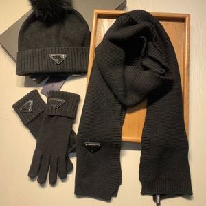 European and American autumn and winter knitted hats, scarves, gloves, warm three piece set of fox fur balls, fashionable woolen hat accessories for both men and women