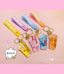 Keychains Fashion Quicksand Ocean Series Milk Tea Cup Keychain Liquid Floating Peal Car Bag Pendant Key Ring Jewelry For Women Gir2241712