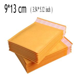 Whole1113cm 100pcs Amarelo Kraft Envelope Envelope Poly Mailer Envelopes acolchoados Bolsas de presente Bulle Bulle para Party7285141