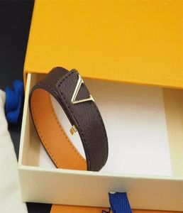 Moda clássico marrom PU pulseira de couro geléia com logotipo de metal em caixa de varejo para presente estoque SL083929085