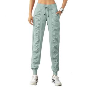 Lulus 1Lululemens-05 Mulheres Yogas Studio Pants Senhoras Secagem Rápida Cordão Correndo Calças Esportivas Soltas Dance Jogger Girls Gym Fiess 6632ess