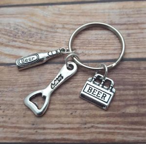 whole 12pcslot Beer Bottle Opener Key chain beer opener charm pendant key ring Personalized Key Chain Truly a Man039s Gift5151809