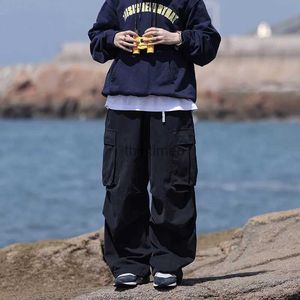 Męskie spodnie streetwear 2023 Spring Harem Casual Pants Men Elastyczny talia Wysokiej jakości spodnie ładunkowe Multi kieszeni Parkour Loose Lose Spodnie YQ231213