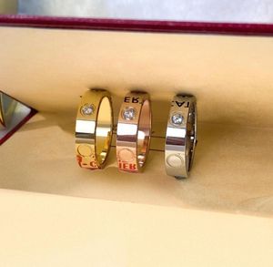 Pierścienie miłosne Women Pierścień Pierścień Para biżuteria stal nierdzewna z diamentami Casual Fashion Street Classic Gold Silver Rose Op2568627