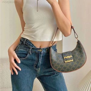 24SS Designer Celina Bag Triomphe Arc De Triomphe Unterarmwickel mit Leder und hochwertigem Gefühl, beliebter französischer Mondwickel, einzelner Schulterstab, Halbmondzähne W