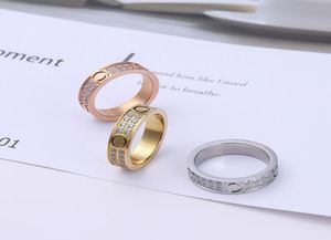 316L Titanium Steel Ring Lovers Rings storlek för kvinnor och män Lyxdesigner smycken nr Box4156277