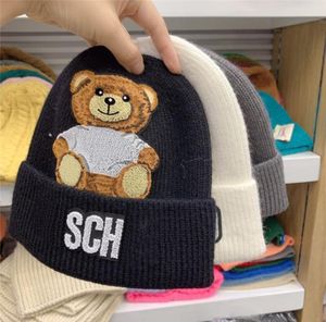 2021 Erkek Kadın Tasarımcı Kaşmir Kaşa Şapkası Kış Örgü Tasarımcıları Şapkalar Şapkalar Erkek Beanies Casquette Ayı Desen Bonnet Örme 7924609