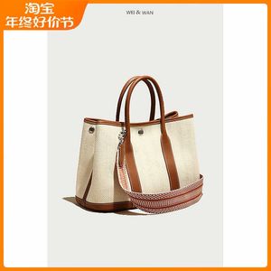 Designer Hremmss Party Garden Tote Bags for Women Online Store Canvas With Top Layer Cowhide Womens Bag Garden 2023 Ny handväska läderkontrasti har riktig logotyp