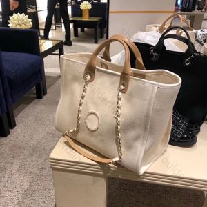 borse firmate grandi borsa tote da spiaggia classica con fiori borsa tote di alta qualità di lusso di grande capacità borsa per celebrità festa trasparente beige nero versatile moda totes bags